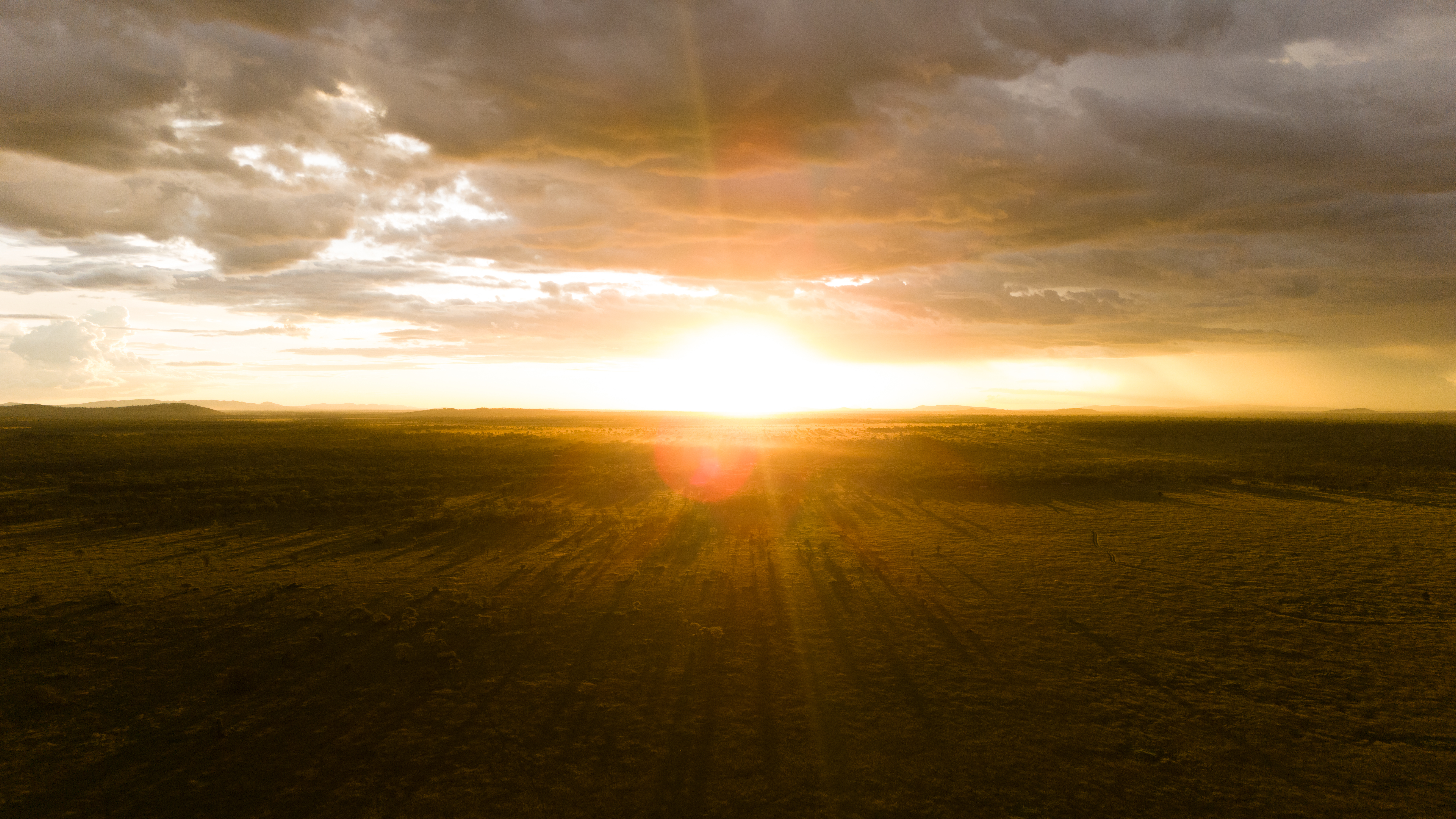 Aerial sunset view over the Serengeti plains – Conserve Safari Tanzania